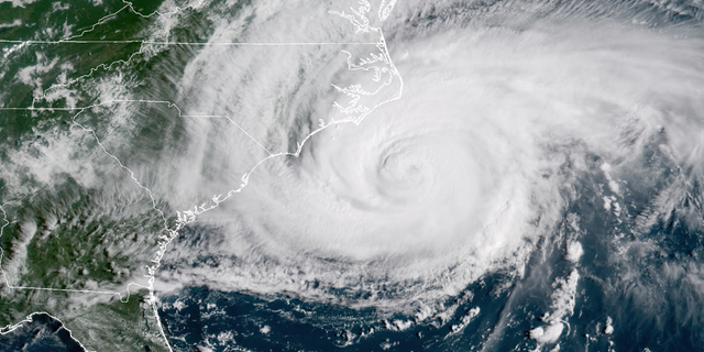 This Sept. 14, 2018, file photo shows a satellite image provided by NOAA showing Hurricane Florence on the eastern coast of the United States.