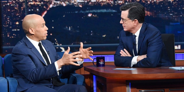 Stephen Colbert had presidential candidate Senator Cory Booker on his March 8, 2019 show. (CBS)