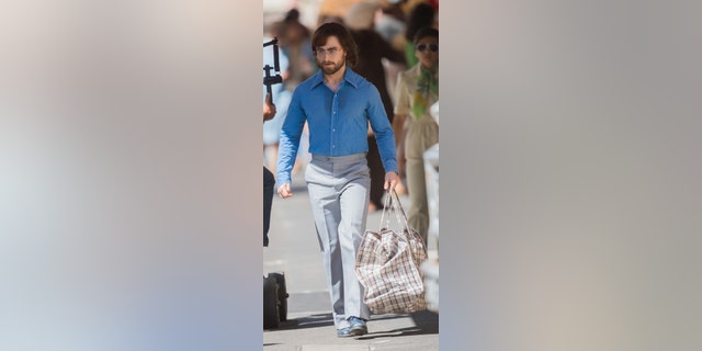 Actor Daniel Radcliffe sweats through his fitted blue shirt during the filming of "Escape from Pretoria" on March 12, 2019 in South Australia.