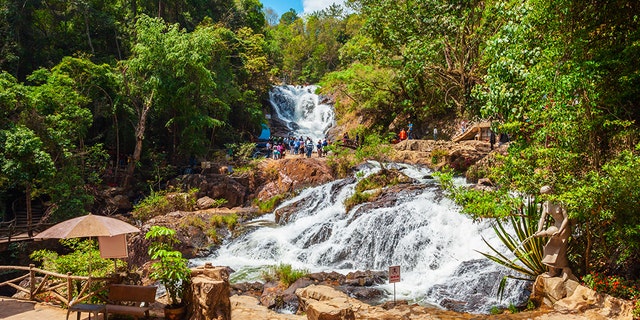 Three tourists died after plunging 50 feet in the Datanla Waterfall area of Vietnam in 2016.