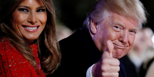 President Donald Trump and first lady Melania Trump participate in the National Christmas Tree Lighting ceremony in 2017. (Reuters)