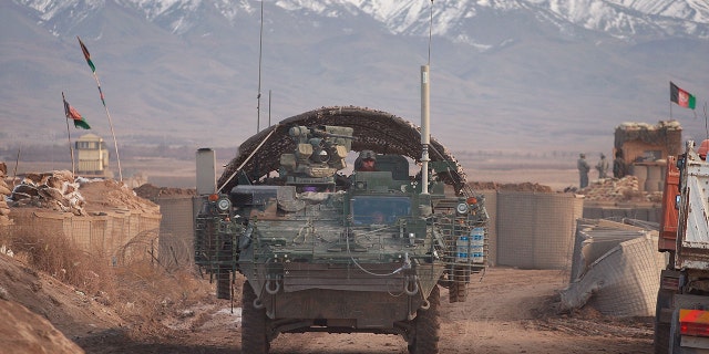 A Stryker armored combat vehicle leaving on a mission from Forward Operating Base Wolverine in December 2009 near Qalat, Afghanistan. Mullah Omar, former leader of the Taliban, reportedly was living near the base for years before his death.