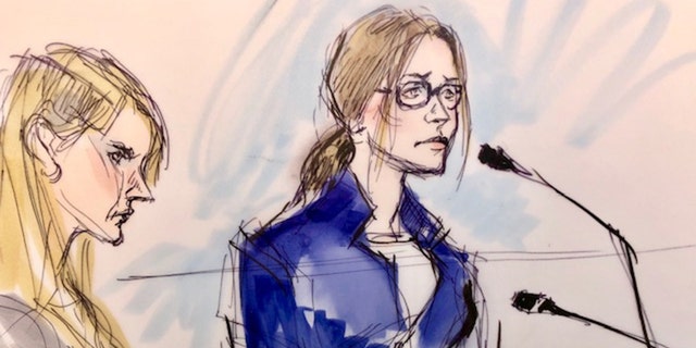 Felicity Huffman, right, appears in this court sketch at an initial hearing for defendants in a racketeering case involving the allegedly fraudulent admission of children to elite universities, at the U.S. federal courthouse in downtown Los Angeles, Calif. 