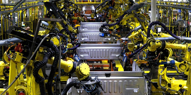 Ford F150 trucks go through robots on the assembly line at the Ford Dearborn Truck Plant on September 27, 2018 in Dearborn, Michigan. The Ford Rouge Plant is celebrating 100 years as America's longest continuously operating auto plant. (Photo by Bill Pugliano/Getty Images)