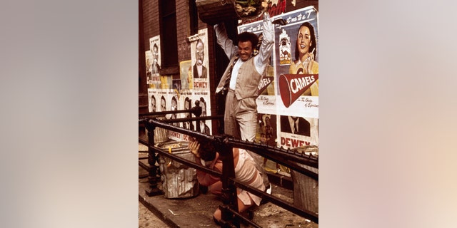 The character of Carlo Rizzi, seen here on the receiving end of Sonny Corleone's trash can, died in the driveway of Michael Corleone's home in the first "Godfather" film. "That movie beat the hell out of me," said Gianni Russi, the actor who played Rizzi.
