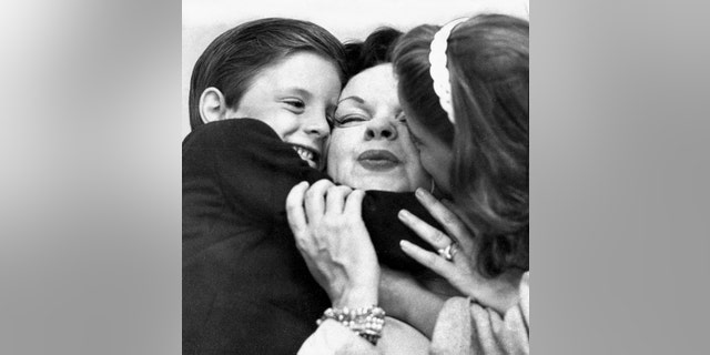 Judy Garland with two of her children, shortly after she settled in England.