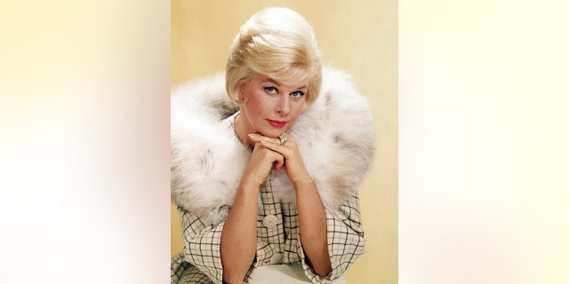 American actress Doris Day in a fur-trimmed coat, circa 1963.