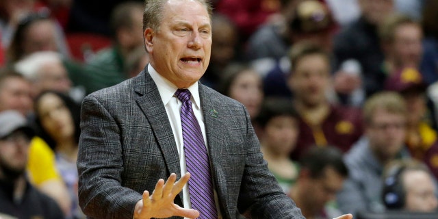 Michigan State coach Tom Izzo moves to his players during the first half of Thursday's game. (AP Photo / Nati Harnik)