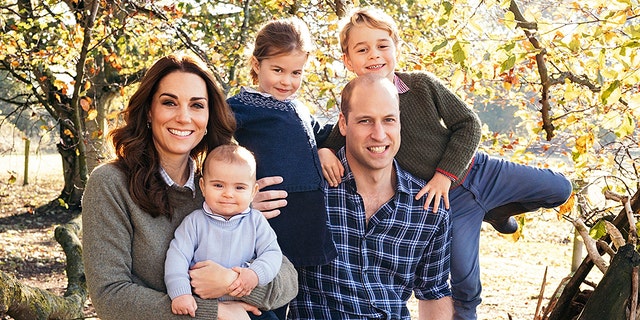 Britain's Prince William and Kate, Duchess of Cambridge with their children Prince George, right, Princess Charlotte, center, and Prince Louis.