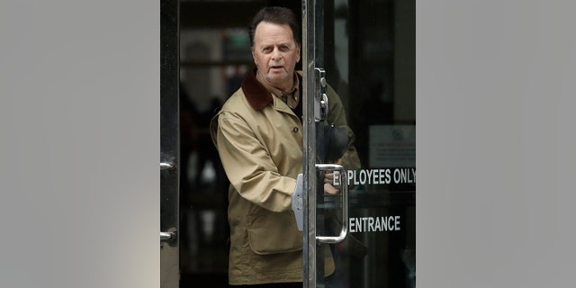 FILE - In this Feb. 25, 2019, file photo, Edwin Hardeman, right, leaves a federal courthouse in San Francisco. (AP Photo/Jeff Chiu)