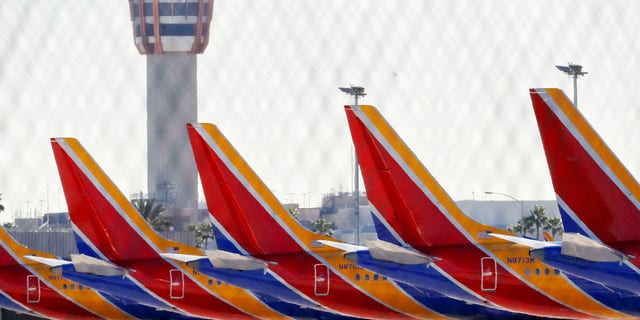 Boeing 737 Max jets are grounded at Sky Harbor International Airport, Thursday, March 14, 2019 in Phoenix.