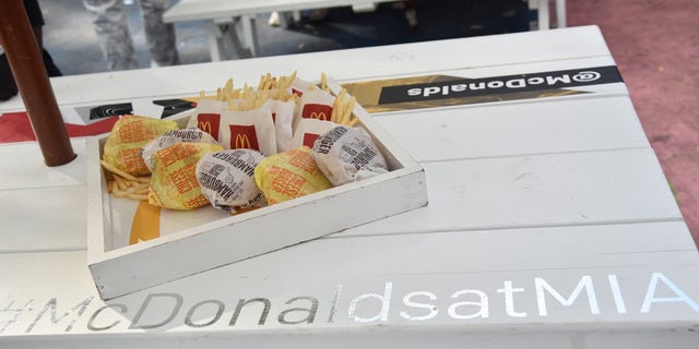 The 21-year-old McDonald's employee reportedly became unhappy with his 18-year-old co-worker, allegedly because she was working too slow.
