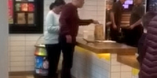 Shocked diners watched as the furious dad confronted staff who had twice made a mistake with his order.