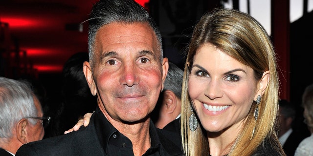 Designer Mossimo Giannulli and his wife Lori Loughlin attend LACMA's 50th Anniversary Gala, sponsored by Christie's, at LACMA on April 18, 2015 in Los Angeles, California.