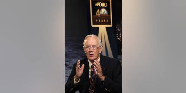 File photo - Apollo 16 astronaut Charles Duke responds to a question during a live television interview on Monday, July 20, 2009, at NASA Headquarters in Washington.