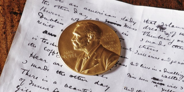 The Nobel Gold Medal and a manuscript belonging to Irish playwright and poet William Butler Yeats (1865-1939) on display at the Sligo Museum, County Sligo, Ireland, January 1968. Yeats won the Nobel Prize for Literature in 1923. ( Photo by RDImages / Epics / Getty Images)