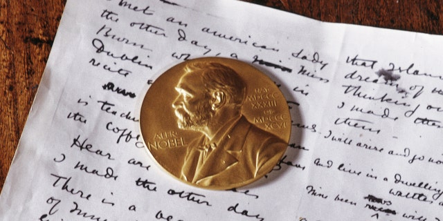 The Nobel Gold Medal and a manuscript belonging to Irish playwright and poet William Butler Yeats (1865-1939) on display at the Sligo Museum, County Sligo, Ireland, January 1968. Yeats won the Nobel Prize for Literature in 1923. ( Photo by RDImages / Epics / Getty Images)