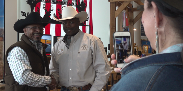 Fred Whitfield (left) has won the Professional Rodeo Cowboys Association World Championships eight times. He has been considered a "trailblazer" for African-Americans wanting to join the sport.