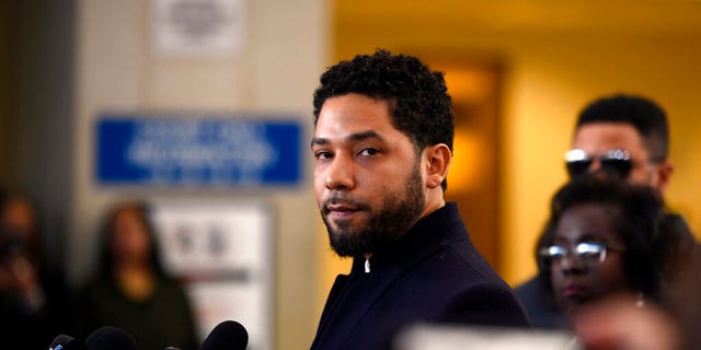 Actor Jussie Smollett talks to the media before leaving Cook County Court after his charges were dropped, Tuesday, March 26, 2019, in Chicago.