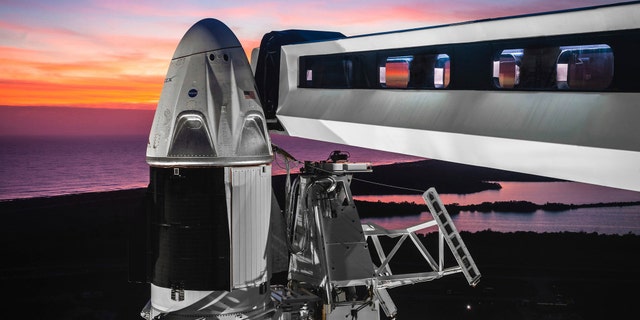 This undated photo made available by SpaceX on Feb 6, 2019 shows the Dragon crew capsule atop a Falcon 9 rocket at the launch pad at Kennedy Space Center in Florida.