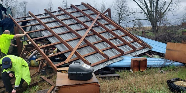 Dozens of emergency responders rushed in to assist in Lee County, Alabama, after what appeared to be a large tornado struck Sunday afternoon as part of a powerful storm system raking the Southeast. (Steven MacLeroy)