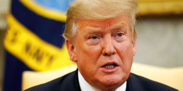In this March 6, 2019, photo, President Donald Trump speaks in the Oval Office of the White House in Washington. (AP Photo/Jacquelyn Martin)