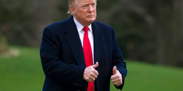 President Trump gives two thumbs up after stepping off Marine One on the South Lawn of the White House, Sunday, March 24, 2019. (AP Photo/Alex Brandon)