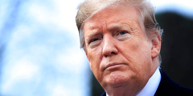 FILE -- In this Wednesday, March 20, 2019 file photo, President Donald Trump speaks to reporters before leaving the White House in Washington. (AP Photo/Manuel Balce Ceneta)
