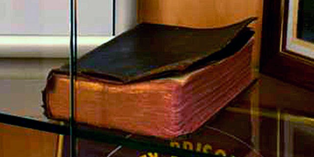 A Bible donated by a World War II veteran on display in a Manchester VA Medical Center memorial is being targeted by the Military Religious Freedom Foundation.