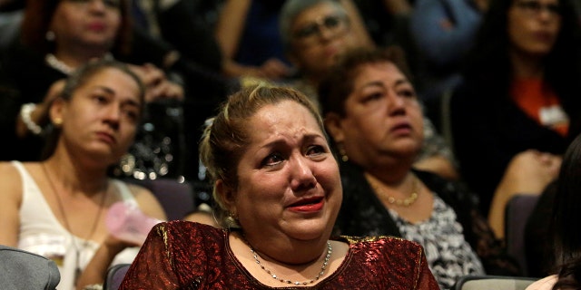 A relative of five youths killed in 2016 after police kidnapped them and then turned them over to members of a drug gang, reacts during a public apology by the Veracruz state government, in Mexico City, Mexico March 4, 2019.