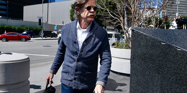 Actor William H. Macy arrives at the federal courthouse in Los Angele, on Tuesday. Macy was not charged; authorities did not say why.