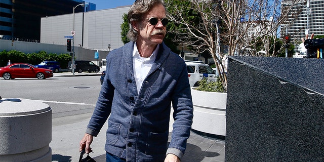 Actor William H. Macy arrives at the federal courthouse in Los Angele, on Tuesday. Macy was not charged; authorities did not say why.