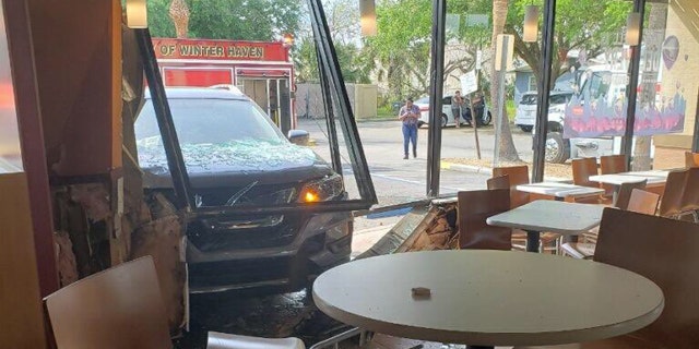 The customer had gotten up seconds before the SUV crashed into his table.