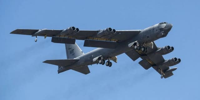 A B-52H Stratofortress takes off.
