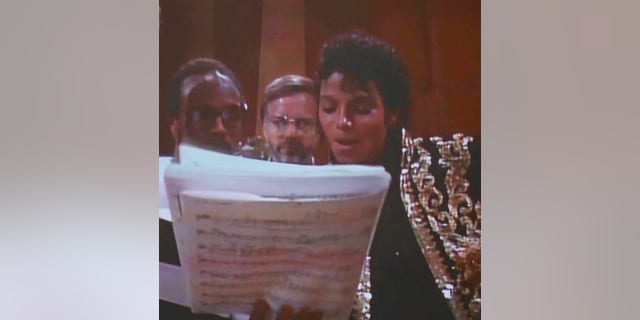 Quincy Jones, Thomas Bahler and Michael Jackson working together in 1985