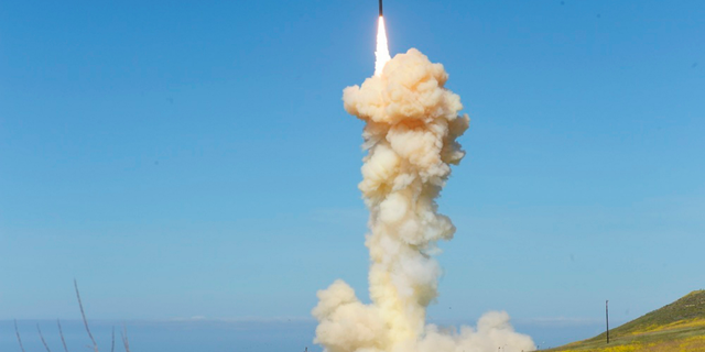 In this photo provided by the Missile Defense Agency, the lead ground-based Interceptor is launched from Vandenberg Air Force Base, Calif., in a "salvo" engagement test of an unarmed missile target Monday, March 25, 2019. In the first test of its kind, the Pentagon on Monday carried out the "salvo" intercept of an unarmed missile soaring over the Pacific, using two interceptor missiles launched from underground silos in southern California. (Missile Defense Agency via AP)