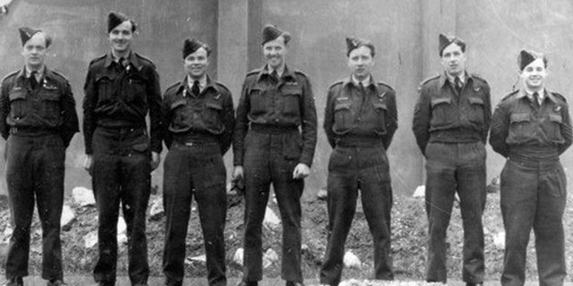 Blackham, center, and members of his squadron in WWII.