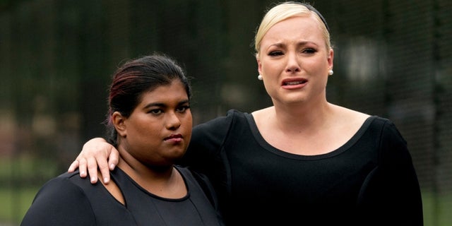 Bridget and Meghan McCain console themselves after the death of their father.