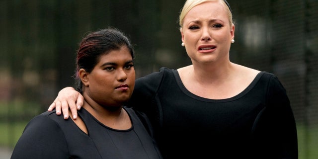 Bridget and Meghan McCain console themselves after the death of their father.