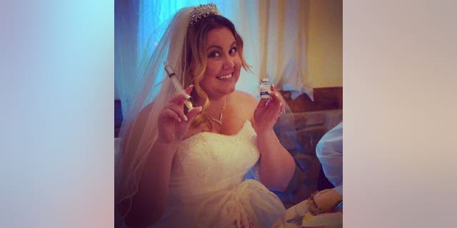 Heil took nausea medication at her reception so she could enjoy her cake.