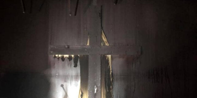 Firefighters in West Virginia say the crosses in a church fire were not harmed.