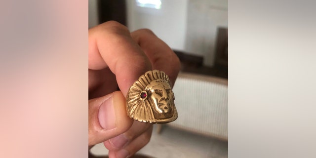 Brady Cobb said this ring, a 24-carat, ruby-adorned Indian head, was given to his father for moving more than a million pounds of marijuana for Pablo Escobar.