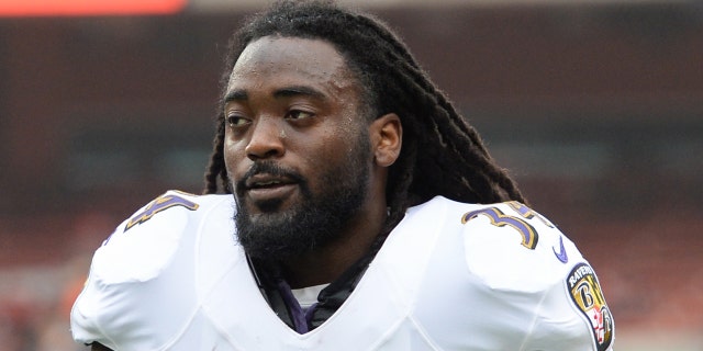 Running back Alex Collins #34 of the Baltimore Ravens runs off the field prior to a game against the Cleveland Browns on October 7, 2018 at FirstEnergy Stadium in Cleveland, Ohio. (Photo by: 2018 Nick Cammett/Diamond Images/Getty Images)