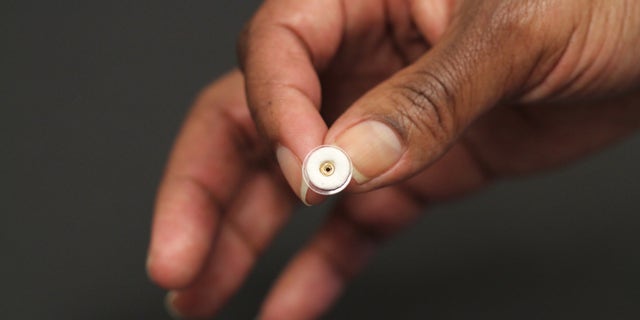 The white ring is the contraceptive patch.