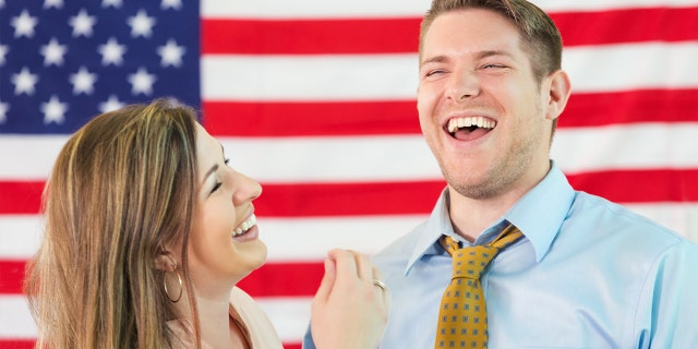 Millennials say date's political views are more important than sex, study reports Couple-laughing-american-flag-istock