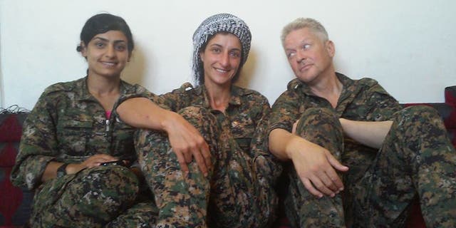 Michael Enright with two YPJ soldiers, both of who have died in the battle fighting ISIS in Syria