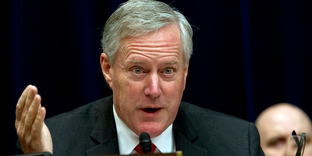 Rep. Mark Meadows, R-N.C. questions Commerce Secretary Wilbur Ross, during the House Oversight Committee hearing on Capitol Hill in Washington, Thursday, March 14, 2019. (AP Photo/Jose Luis Magana)