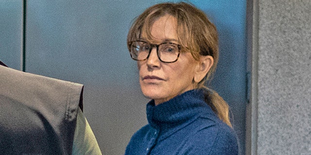 Felicity Huffman is seen inside the Edward R. Roybal Federal Building and U.S. Courthouse in Los Angeles, on Tuesday, March 12, 2019. (Photo by DAVID MCNEW / AFP) (DAVID MCNEW/AFP/Getty Images)