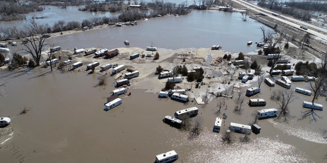 This Wednesday, March 20, 2019 aerial photo shows flooding near the Platte River in in Plattsmouth, Neb., south of Omaha.