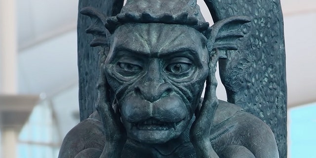 The airport shared footage of the chatty gargoyle surprising passersby to YouTube, where it has since gone viral with over 70,000 views.